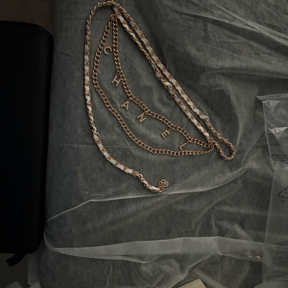 Gold-Tone Chain Belt with White Leather Weave and Floral Charm